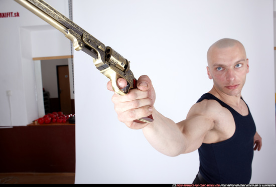 Man Adult Muscular White Fighting with gun Standing poses Sportswear