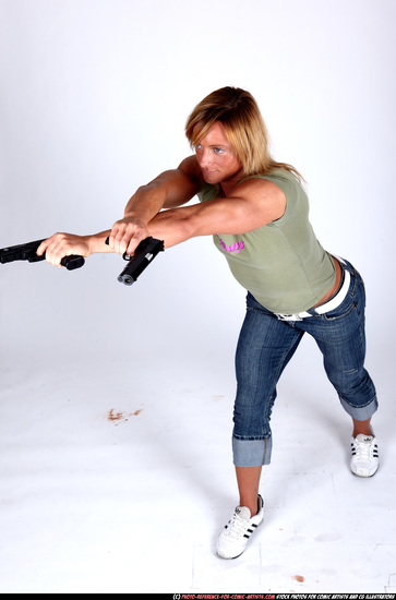 Woman Adult Muscular White Fighting with gun Standing poses Sportswear