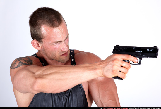 Man Adult Muscular White Fighting with gun Standing poses Casual