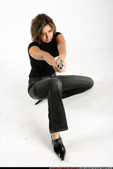 Woman Adult Athletic White Fighting with gun Kneeling poses Casual