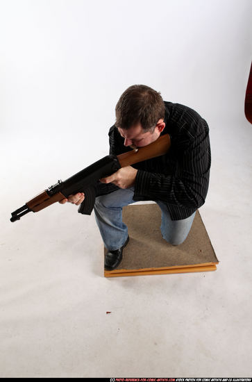 Man Adult Chubby White Fighting with submachine gun Kneeling poses Casual