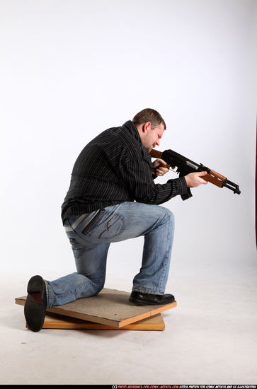 Man Adult Chubby White Fighting with submachine gun Kneeling poses Casual