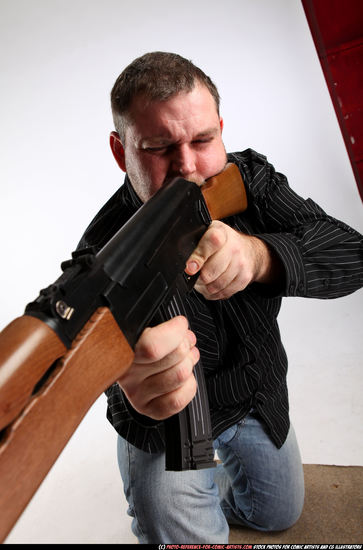 Man Adult Chubby White Fighting with submachine gun Kneeling poses Casual