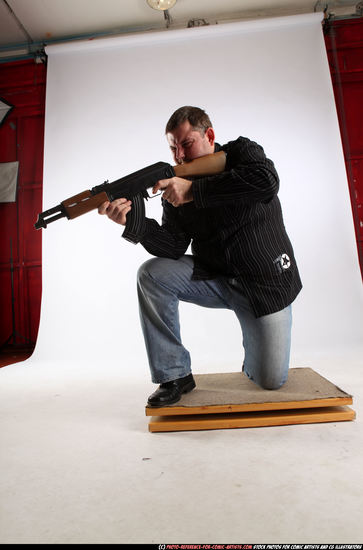 Man Adult Chubby White Fighting with submachine gun Kneeling poses Casual