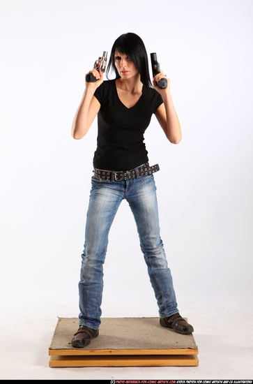 Woman Adult Athletic White Fighting with gun Standing poses Sportswear