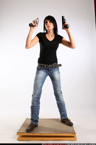 Woman Adult Athletic White Fighting with gun Standing poses Sportswear