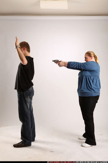 Man & Woman Adult Average White Fighting with gun Standing poses Casual