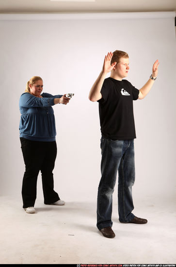 Man & Woman Adult Average White Fighting with gun Standing poses Casual