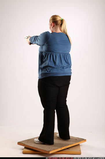 Woman Adult Chubby White Fighting with gun Standing poses Casual