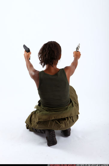 Woman Adult Athletic Black Fighting with gun Kneeling poses Army