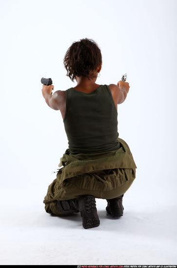 Woman Adult Athletic Black Fighting with gun Kneeling poses Army