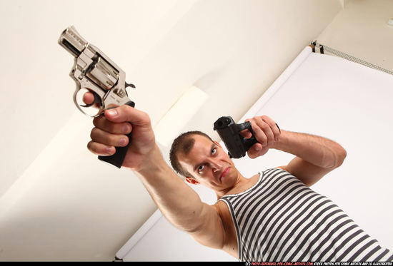 Man Adult Athletic White Fighting with gun Standing poses Casual