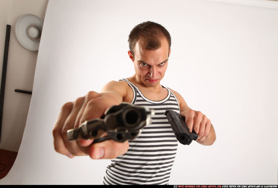 Man Adult Athletic White Fighting with gun Standing poses Casual