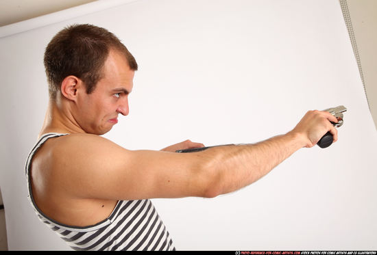 Man Adult Athletic White Fighting with gun Standing poses Casual