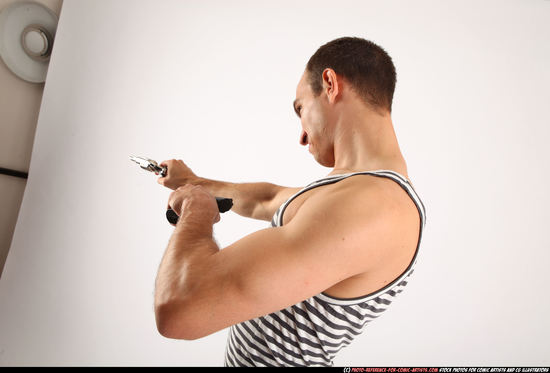 Man Adult Athletic White Fighting with gun Standing poses Casual