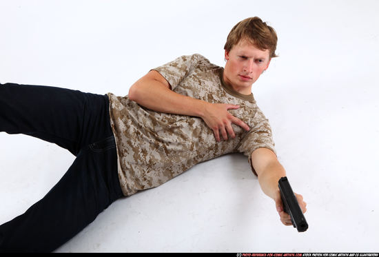 Man Young Athletic White Fighting with gun Laying poses Sportswear