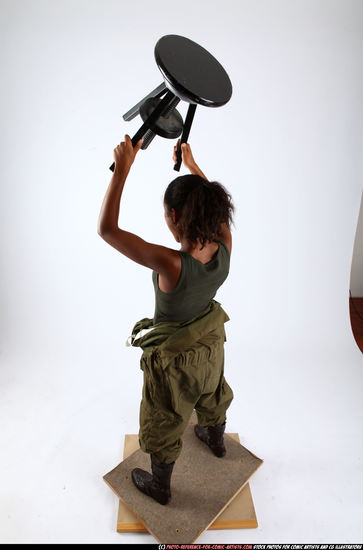 Woman Young Athletic Black Throwing Standing poses Army