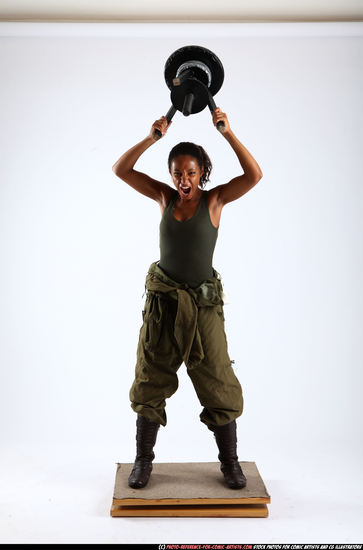 Woman Young Athletic Black Throwing Standing poses Army