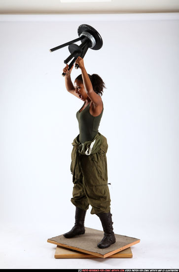 Woman Young Athletic Black Throwing Standing poses Army