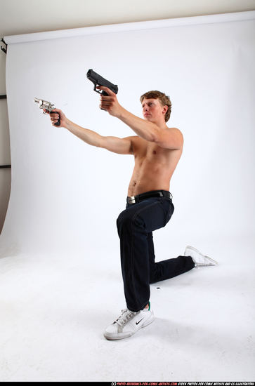 Man Young Athletic White Fighting with gun Kneeling poses Pants