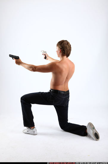 Man Young Athletic White Fighting with gun Kneeling poses Pants