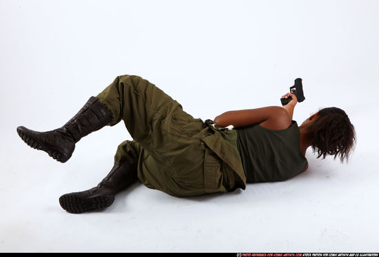 Woman Young Athletic Black Fighting with gun Laying poses Army