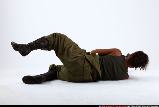 Woman Young Athletic Black Fighting with gun Laying poses Army