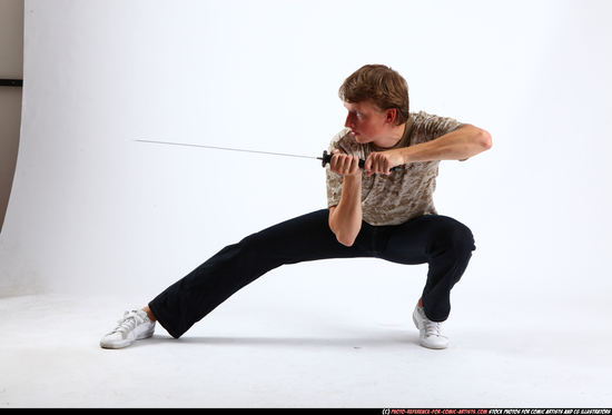 Man Young Athletic White Fighting with sword Kneeling poses Sportswear