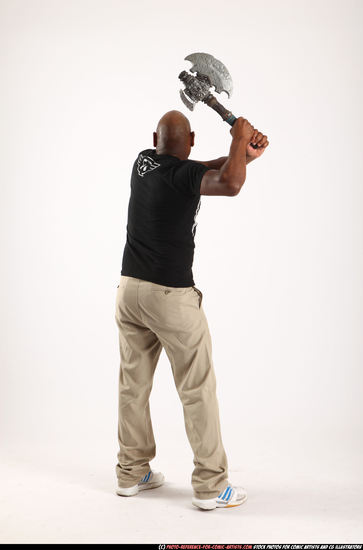 Man Old Average Black Fighting with sword Standing poses Casual