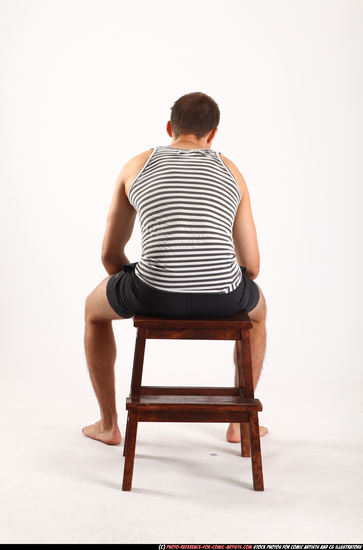 Man Adult Athletic White Neutral Sitting poses Sportswear