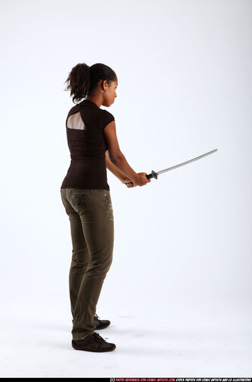 Woman Young Athletic Black Fighting with sword Standing poses Casual