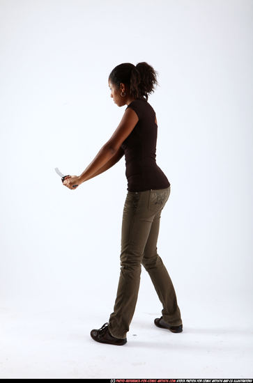 Woman Young Athletic Black Fighting with sword Standing poses Casual