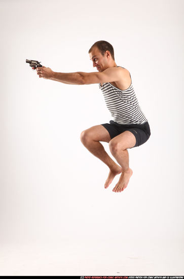 Man Adult Athletic White Fighting with gun Moving poses Sportswear