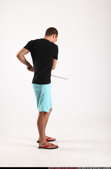 Man Adult Athletic White Fighting with sword Standing poses Sportswear