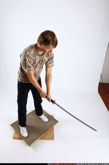 Man Young Athletic White Fighting with sword Standing poses Casual