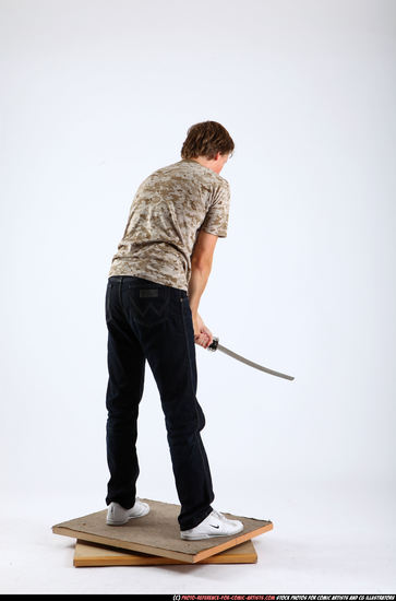 Man Young Athletic White Fighting with sword Standing poses Casual