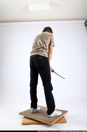 Man Young Athletic White Fighting with sword Standing poses Casual