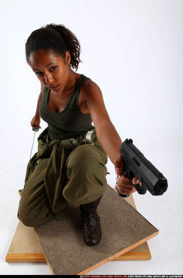 Woman Young Athletic Black Fighting with gun Kneeling poses Army