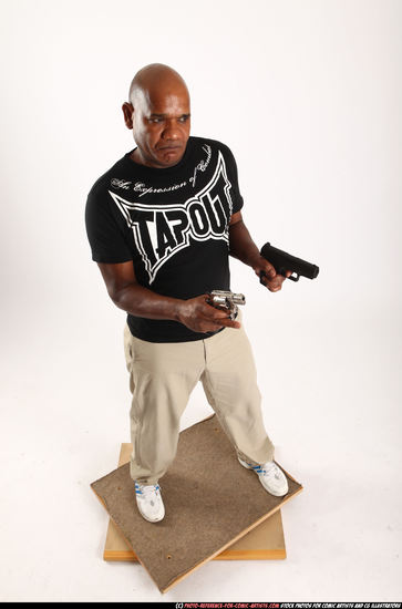 Man Old Chubby Black Fighting with gun Standing poses Casual