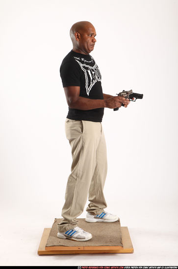 Man Old Chubby Black Fighting with gun Standing poses Casual