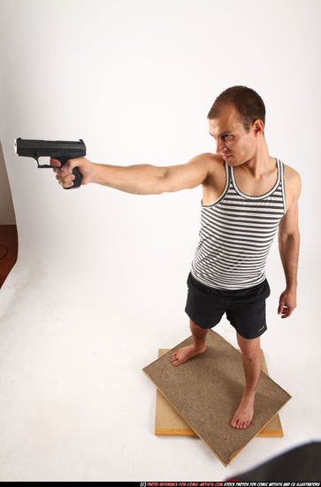 Man Adult Athletic White Fighting with gun Standing poses Sportswear