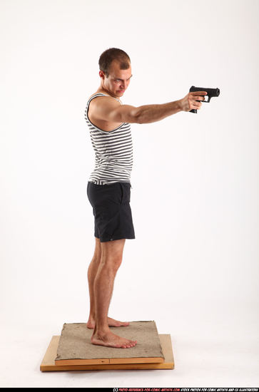 Man Adult Athletic White Fighting with gun Standing poses Sportswear