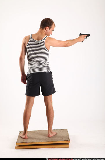 Man Adult Athletic White Fighting with gun Standing poses Sportswear