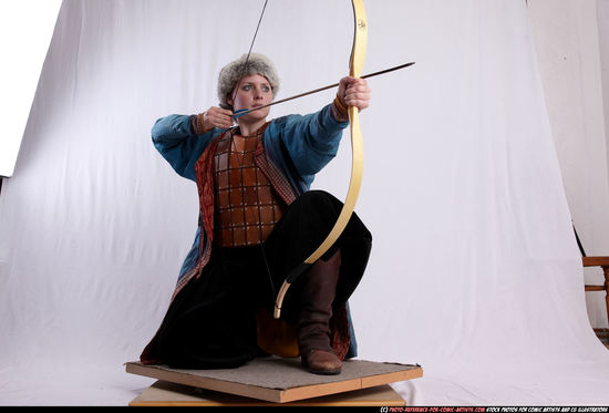 Woman Adult Average White Fighting with bow Kneeling poses Army