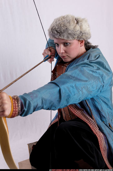 Woman Adult Average White Fighting with bow Kneeling poses Army