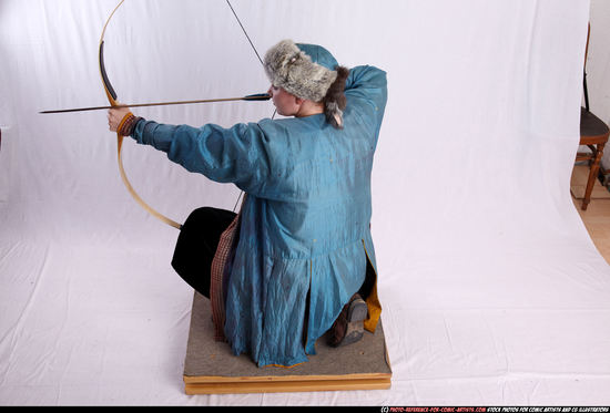 Woman Adult Average White Fighting with bow Kneeling poses Army