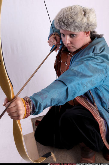 Woman Adult Average White Fighting with bow Kneeling poses Army