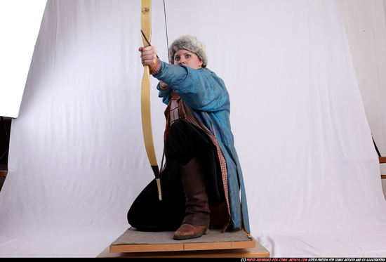 Woman Adult Average White Fighting with bow Kneeling poses Army