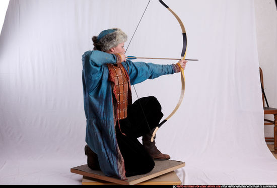 Woman Adult Average White Fighting with bow Kneeling poses Army