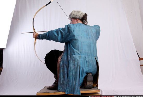 Woman Adult Average White Fighting with bow Kneeling poses Army